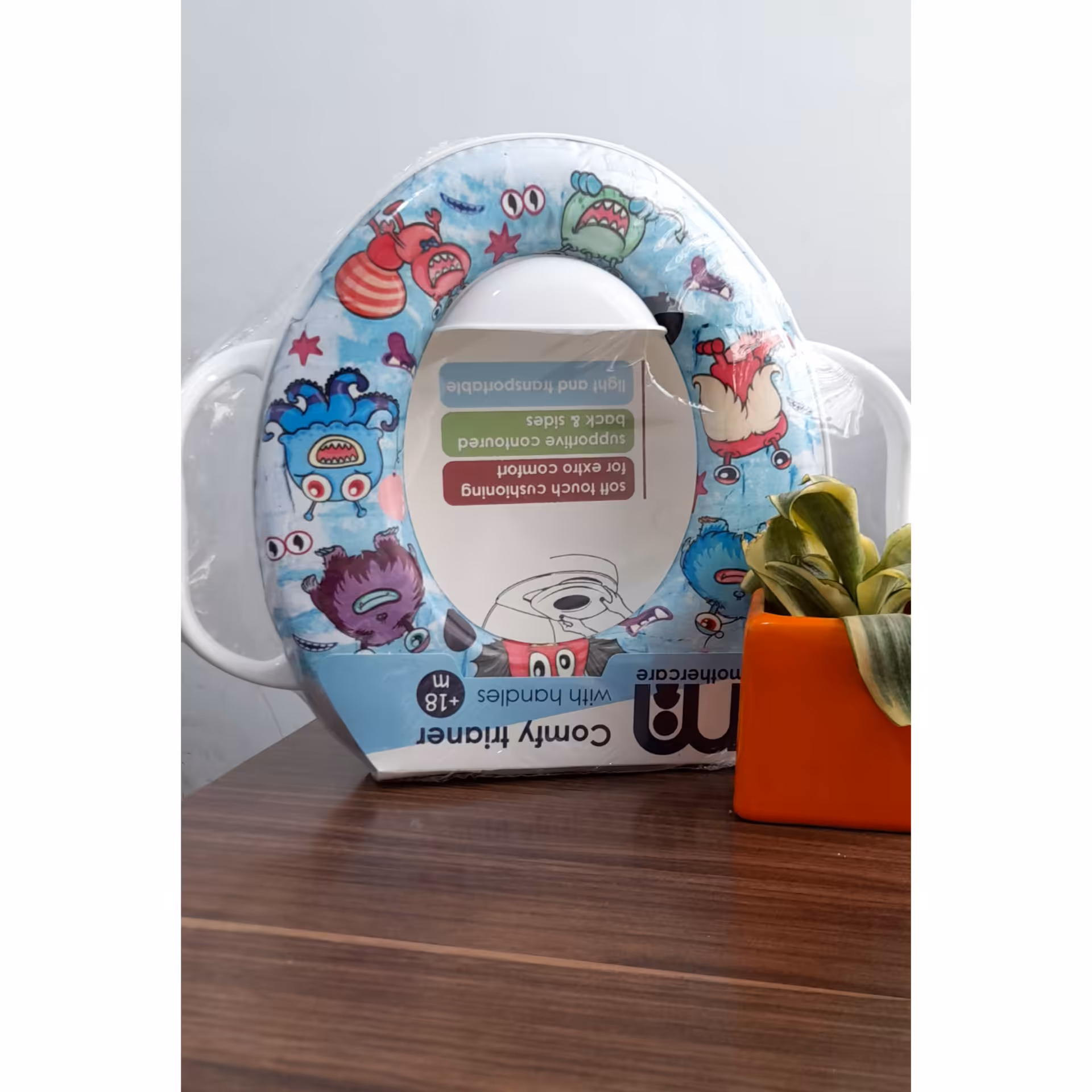 تبدیل توالت مادرکر mothercare طرح عروسکی comfy trainer
