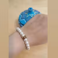 دستبند مروارید با خرجکار تاج DT06