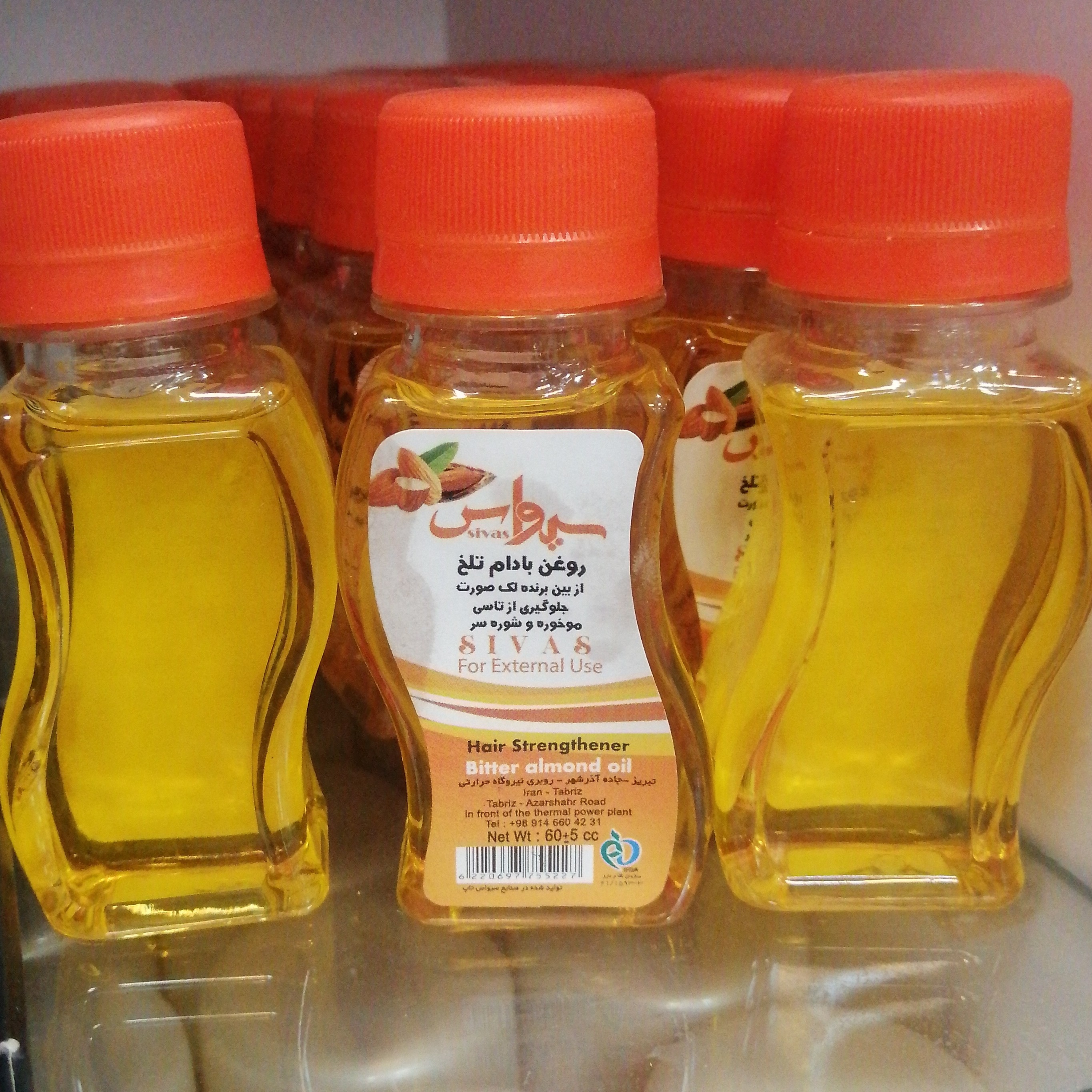 روغن بادام تلخ از بین برنده لک صورت جلوگیری از تاسی موخوره و شوره سر