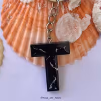 سرکلیدی حرفT