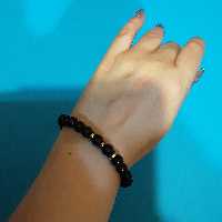 دستبند بافت.کار شده با سنگهای اونیکس مشکی و 3 رینگ هولوگرامی.قابل سایز.unisex