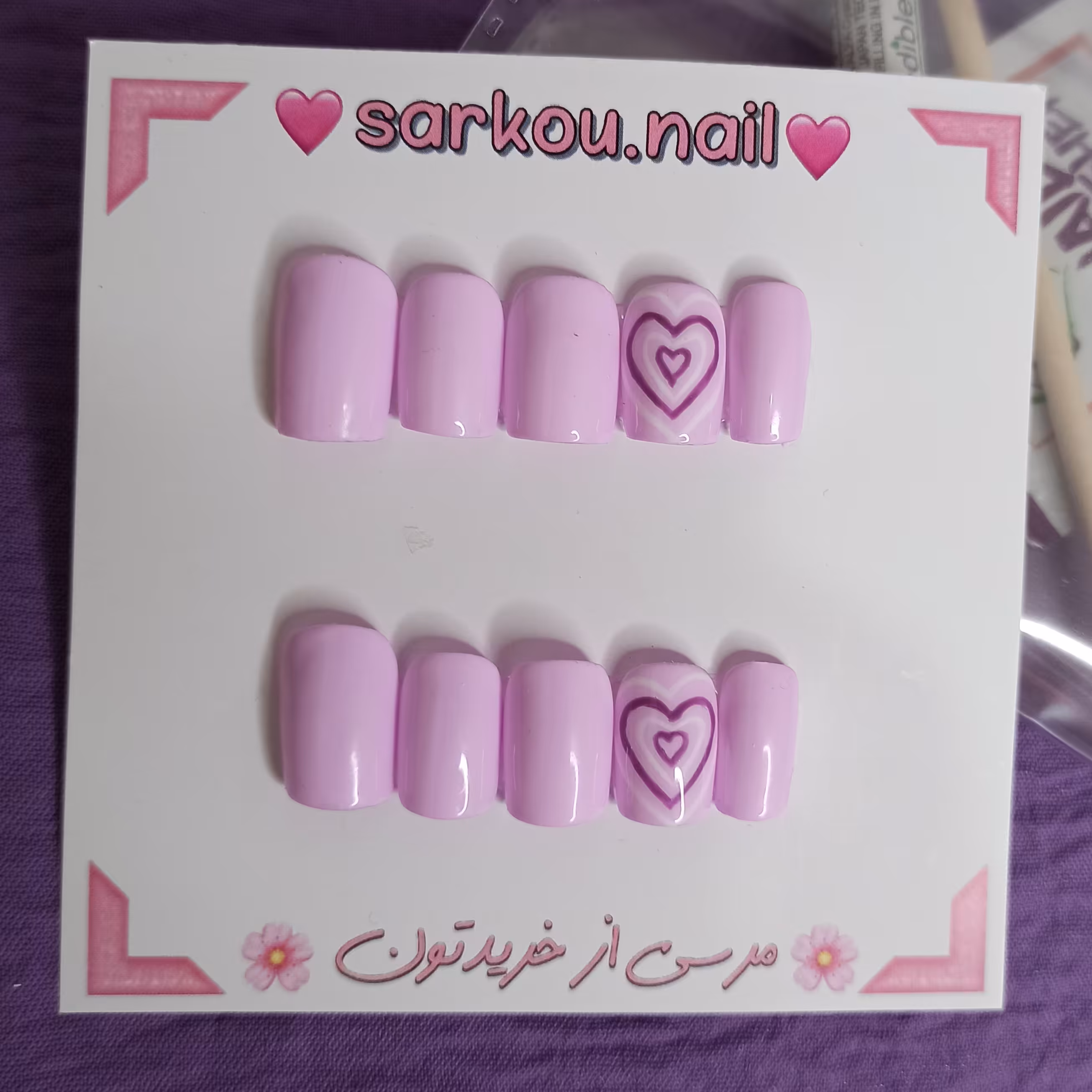 ناخن مصنوعی با مواد کاشت ناخن طرح قلب دار یاسی رنگ  