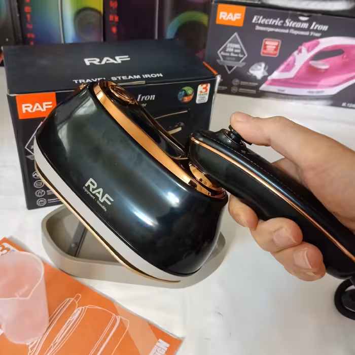 اتو بخار مسافرتی 1000 وات راف RAF مدل R.1142 دسته چرخشی بسیار شیک و زیبا  - فروشگاه قشمی شاپ