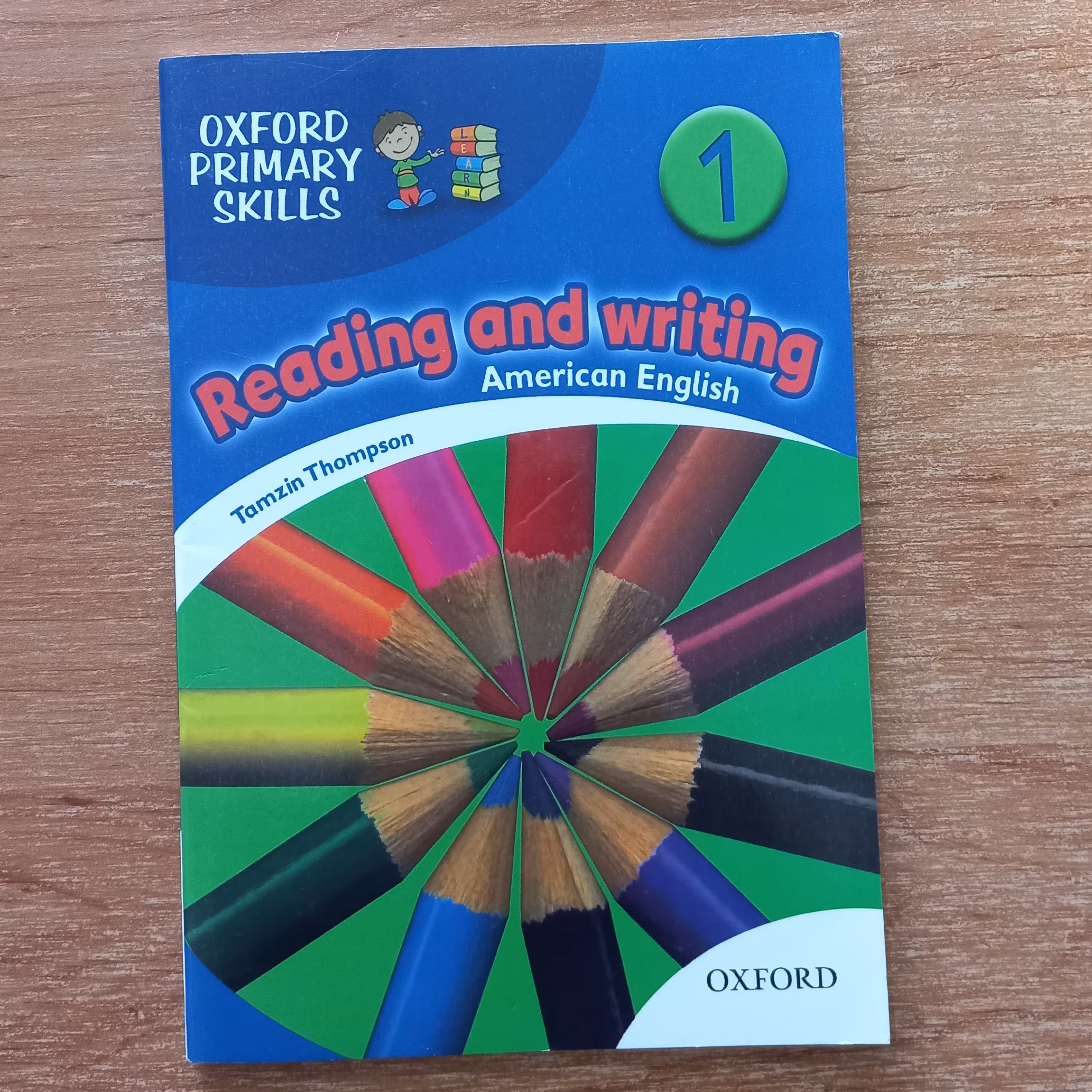 کتاب امریکن ریدینگ اند رایتینگ American Reading and Writing 1 منطبق با کتاب امریکن فمیلی فرندز  1