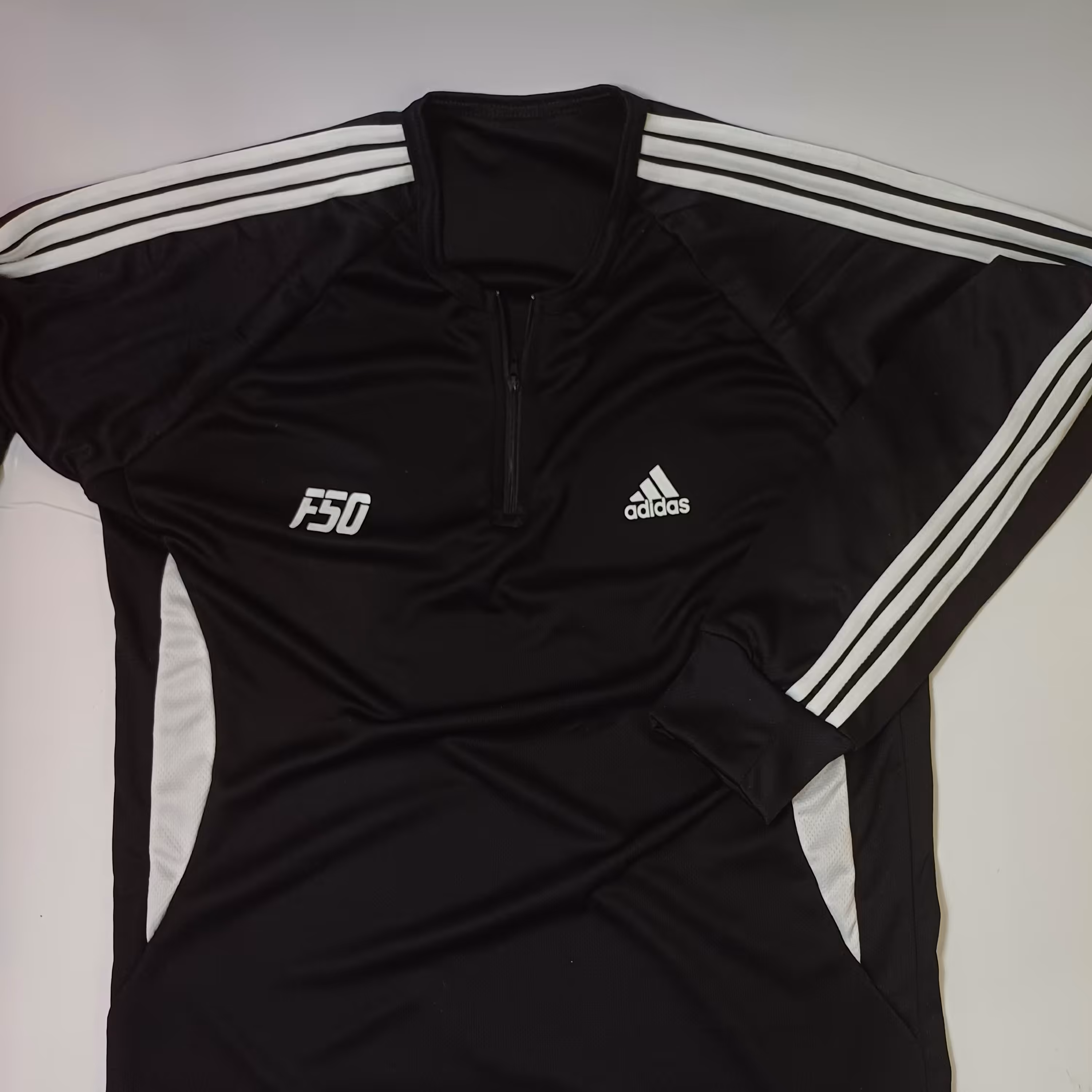 تی شرت آستین بلند نیم زیپ طرح ادیداسF50