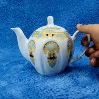 قوری چینی طرح شروین فیروزه ای متوسط