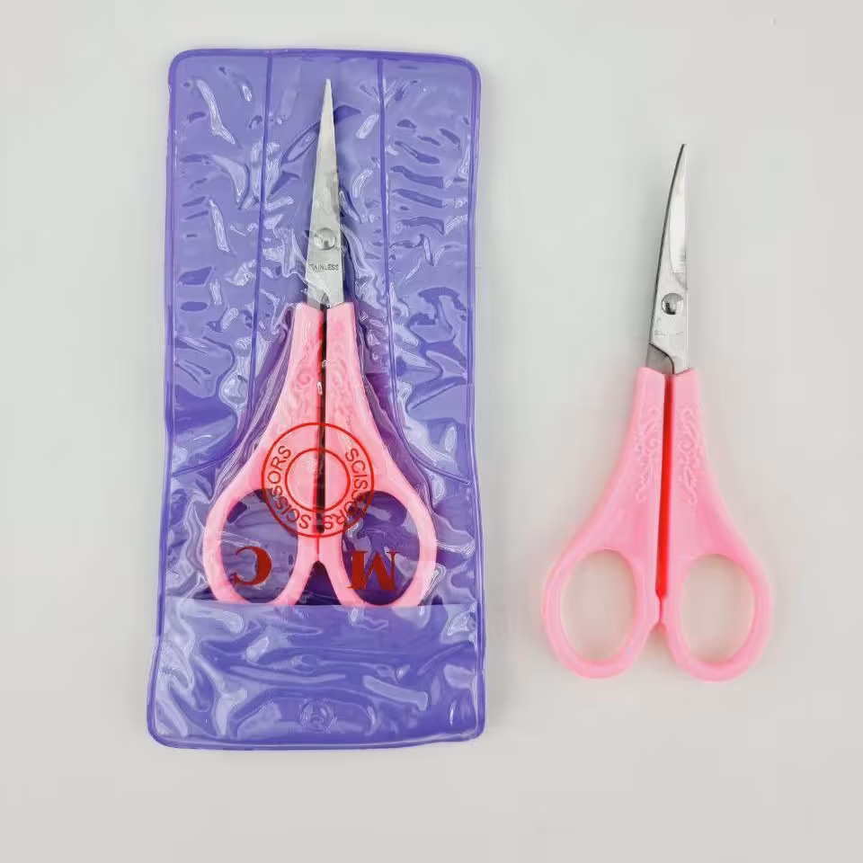 قیچی ابرو دسته صورتی