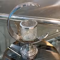 شمعدان مدل هلال ماه سایز متوسط رنگ نقره ایی 