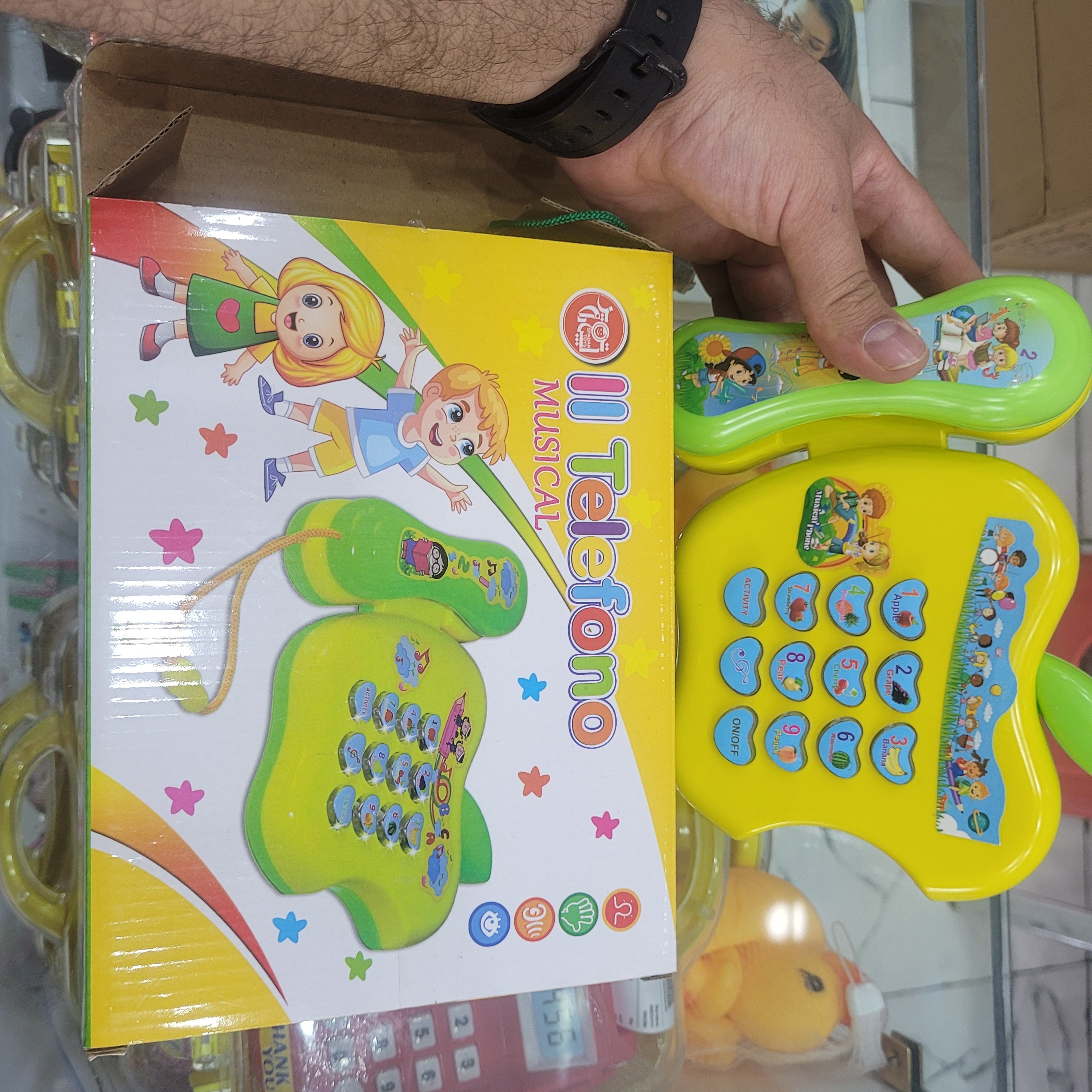 تلفن اسباب بازی سیب موزیکال باتری خور سبز رنگ 