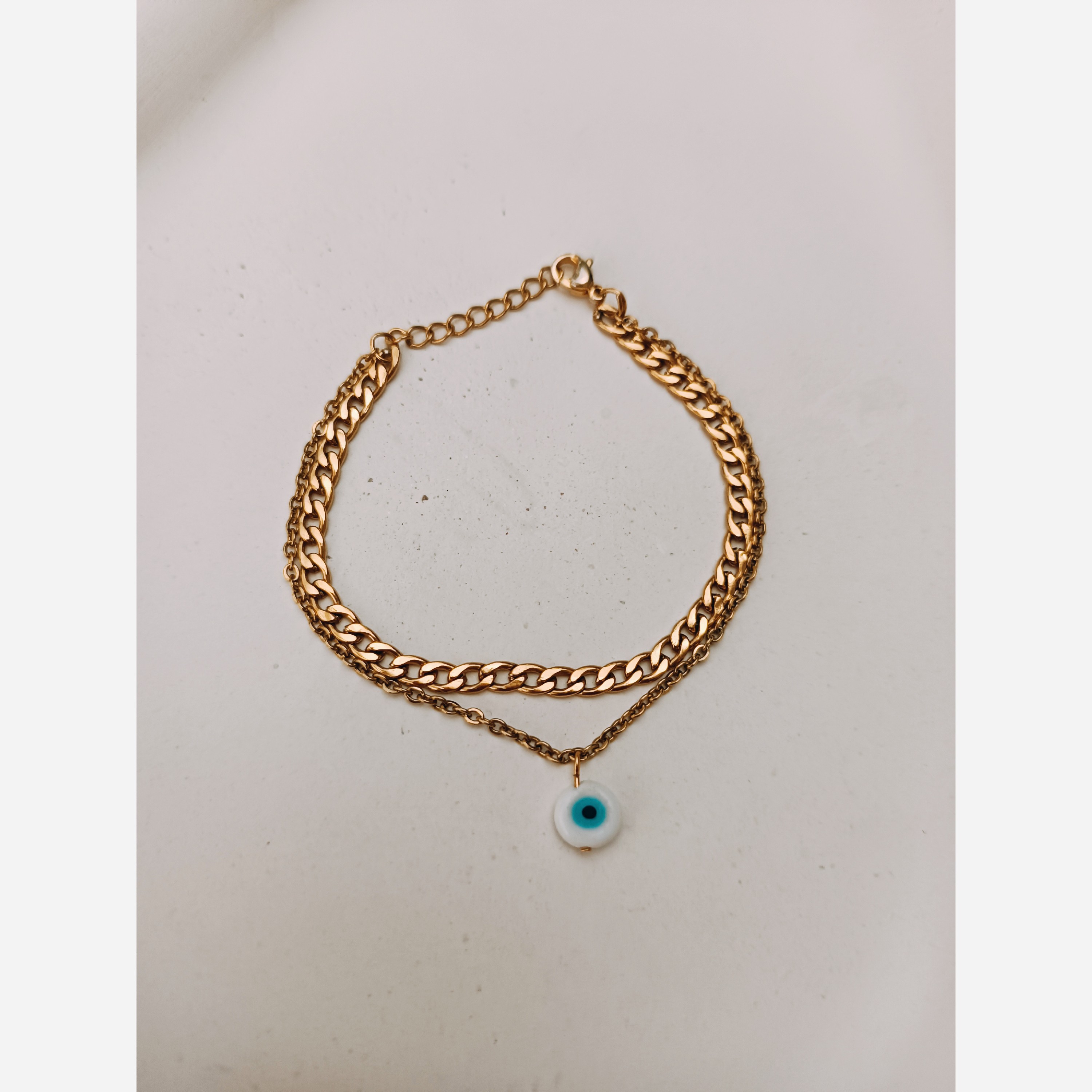 دستبند دو ردیفه ی استیل کارتیر ظریف با آویزچشم و نظر