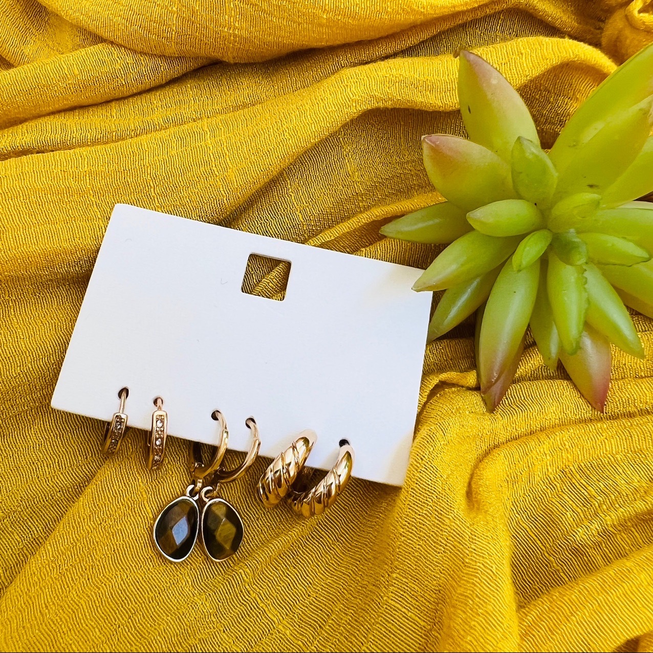 پک سه عددی گوشواره ی طلایی سنگ قهوه ای 