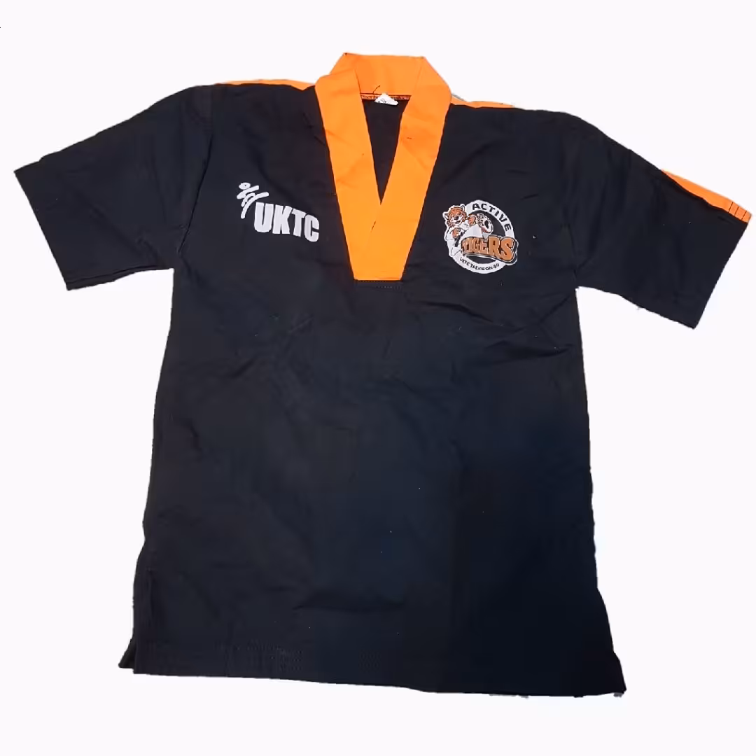 لباس رزمی تکواندو مشکی نارنجی فقط پیراهن 