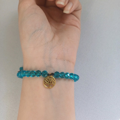 دستبند زنانه و دخترانه کریستالی آبی براق با خرجکار درخت