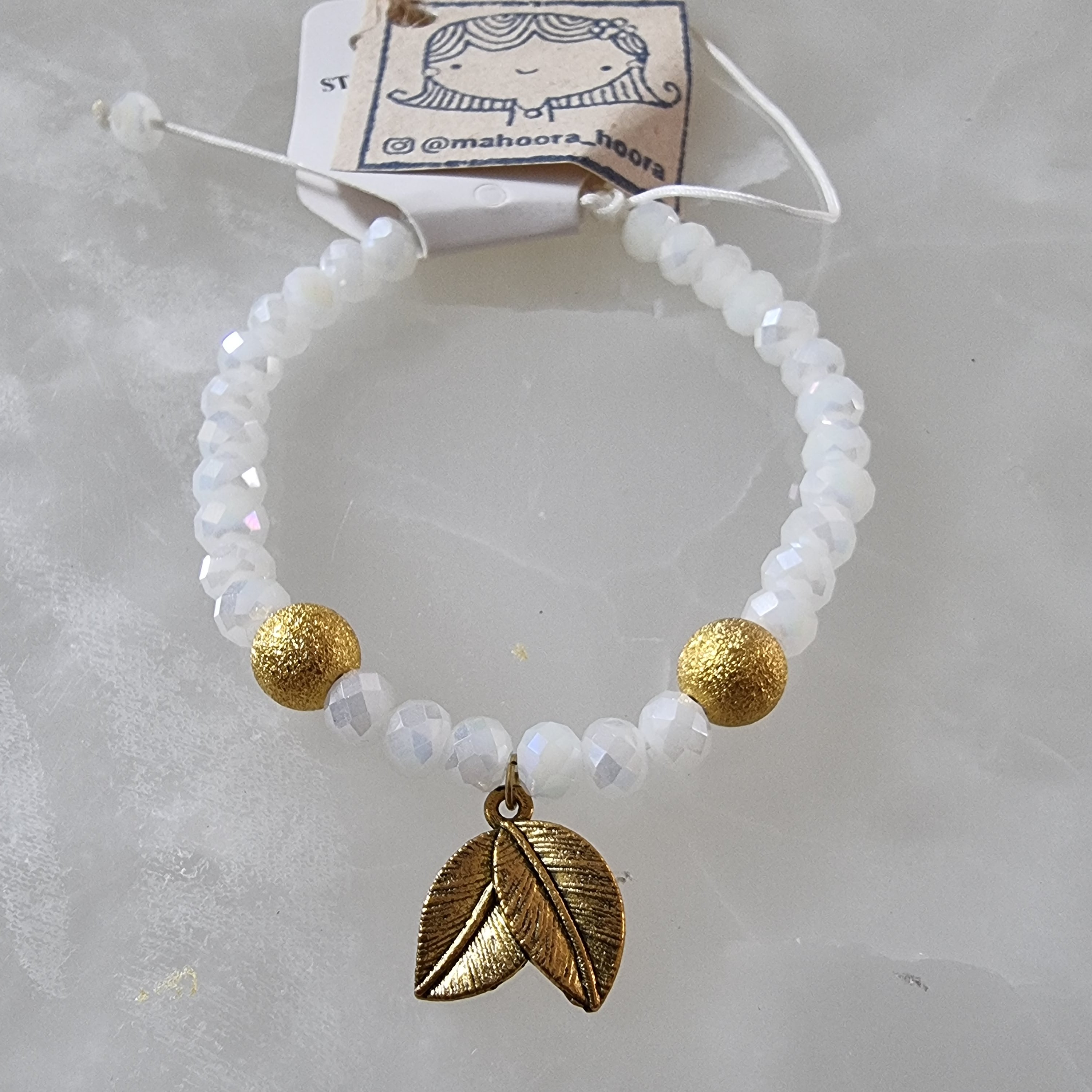 دستبند سفید و طلایی