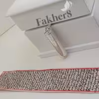 حرز امام جواد ع دستنویس روی پوست آهو و لوله نقره حرز وتبرکی مشهد