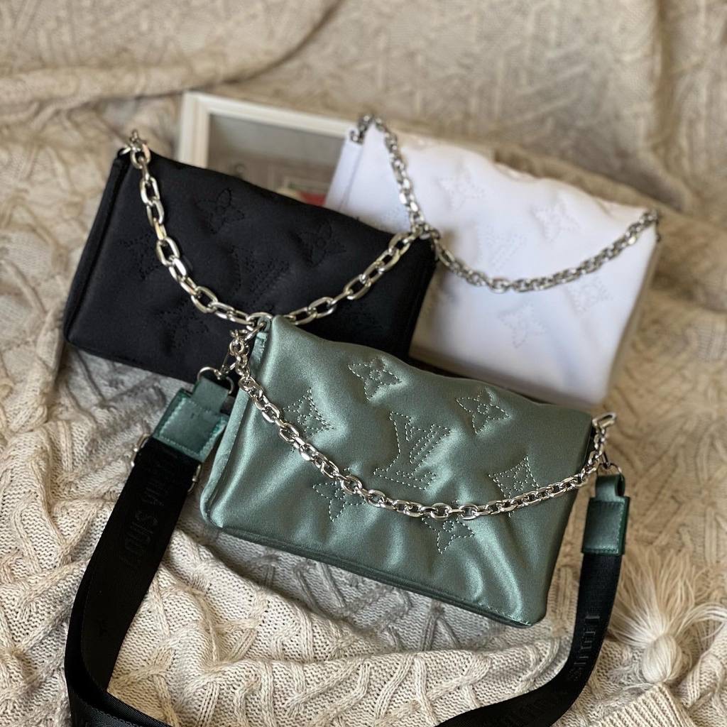 کیف زنانه مجلسی جنس ساتن دارای رنگ بندی و بندپهن شیک مارک ال وی