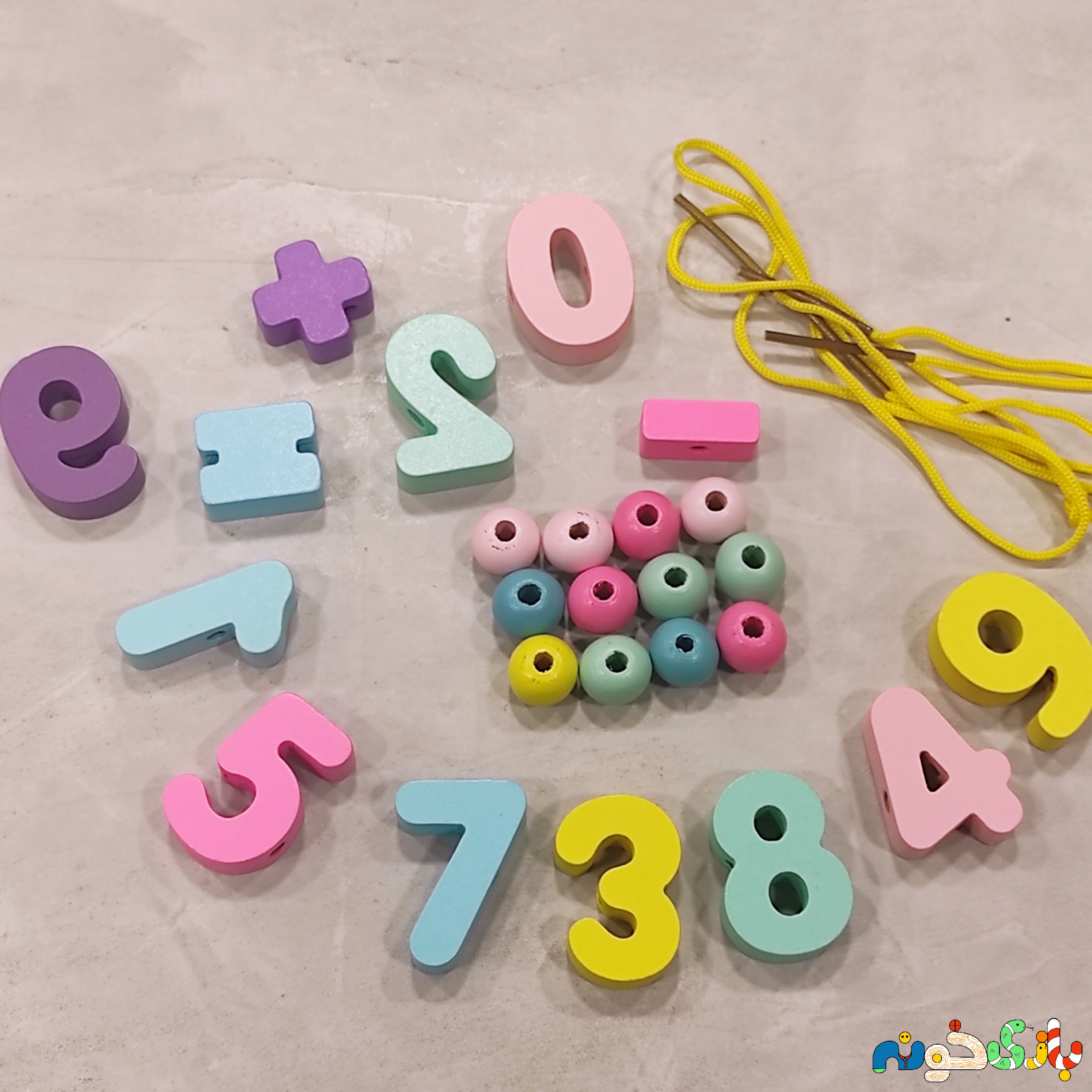 اسباب بازی نخ و مهره چوبی وارداتی رنگ پاستیلی جعبه قوطی 36 مهره دو نخ