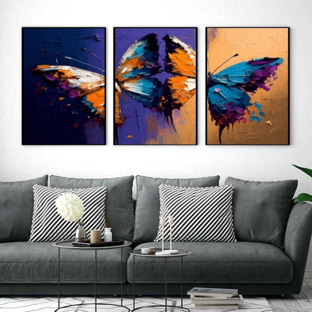 تابلو دکوراتیو پروانه آبی ونارنجی سه تکه 