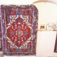 قالیچه دستبافت، نقشه آفتابی (پس کرایه)