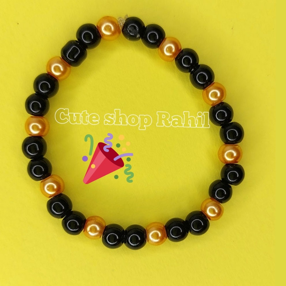 دستبند مهره اونیکس با دو رنگ سیاه و سفید 