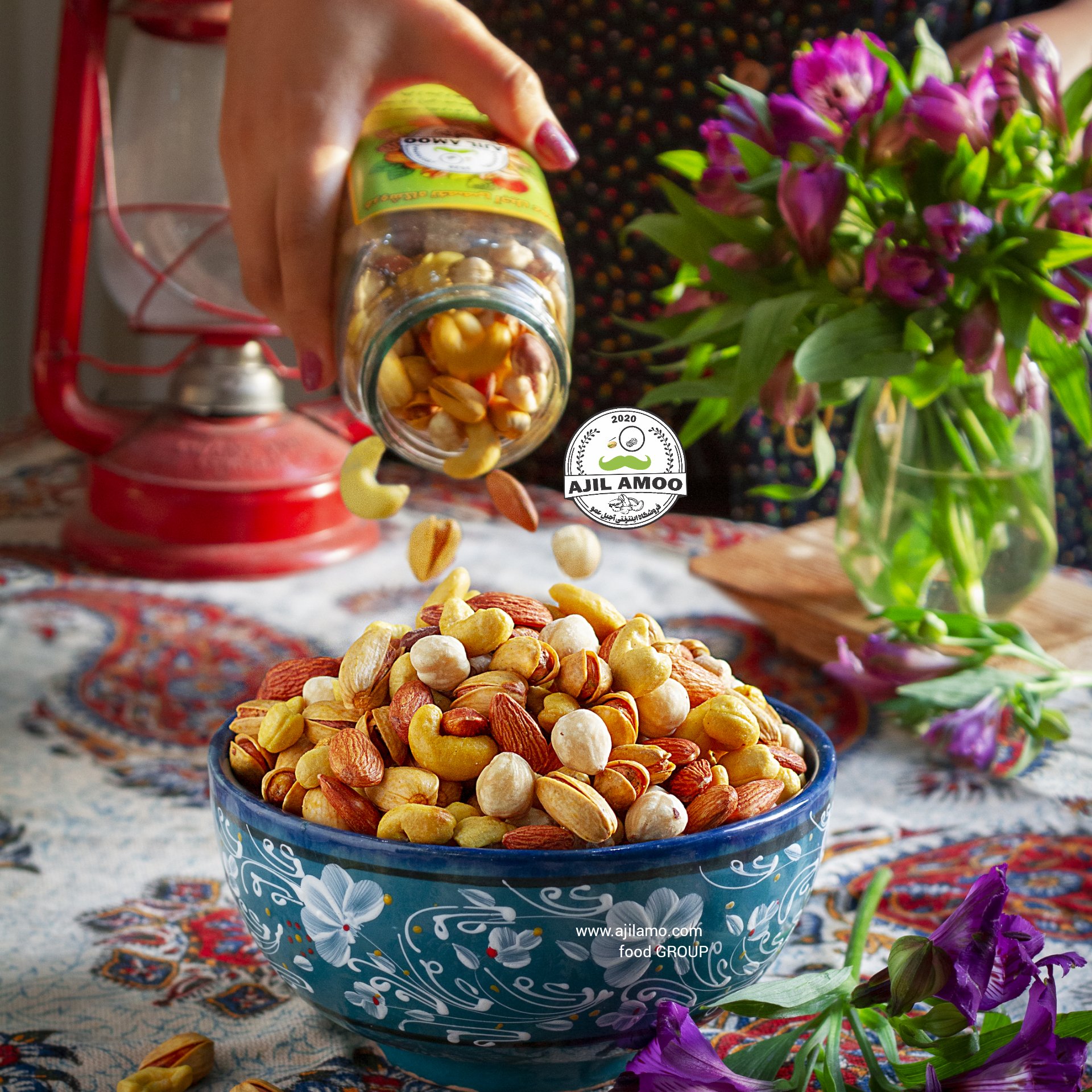 آجیل چهار مغز زعفرانی با بالاترین کیفیت و ترکیب مساوی شامل پسته اکبری دستچین شده، مغز بادام درختی، مغز فندق و بادام هندی