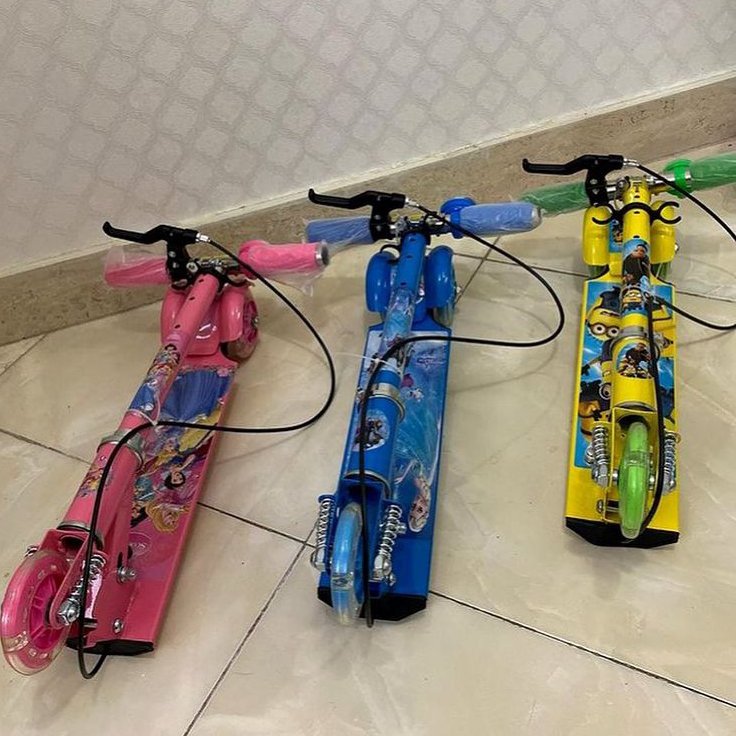 اسکوتر فلزی کودک تاشو چراغدار زنگ دار ترمز دستی و پدالی دخترونه و پسرونه