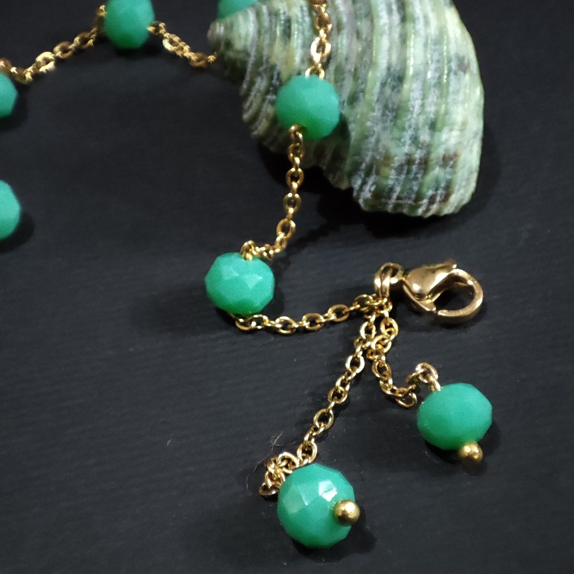 دستبند با زنجیر استیل رنگ ثابت و مهره کریستال فیروزه رنگ