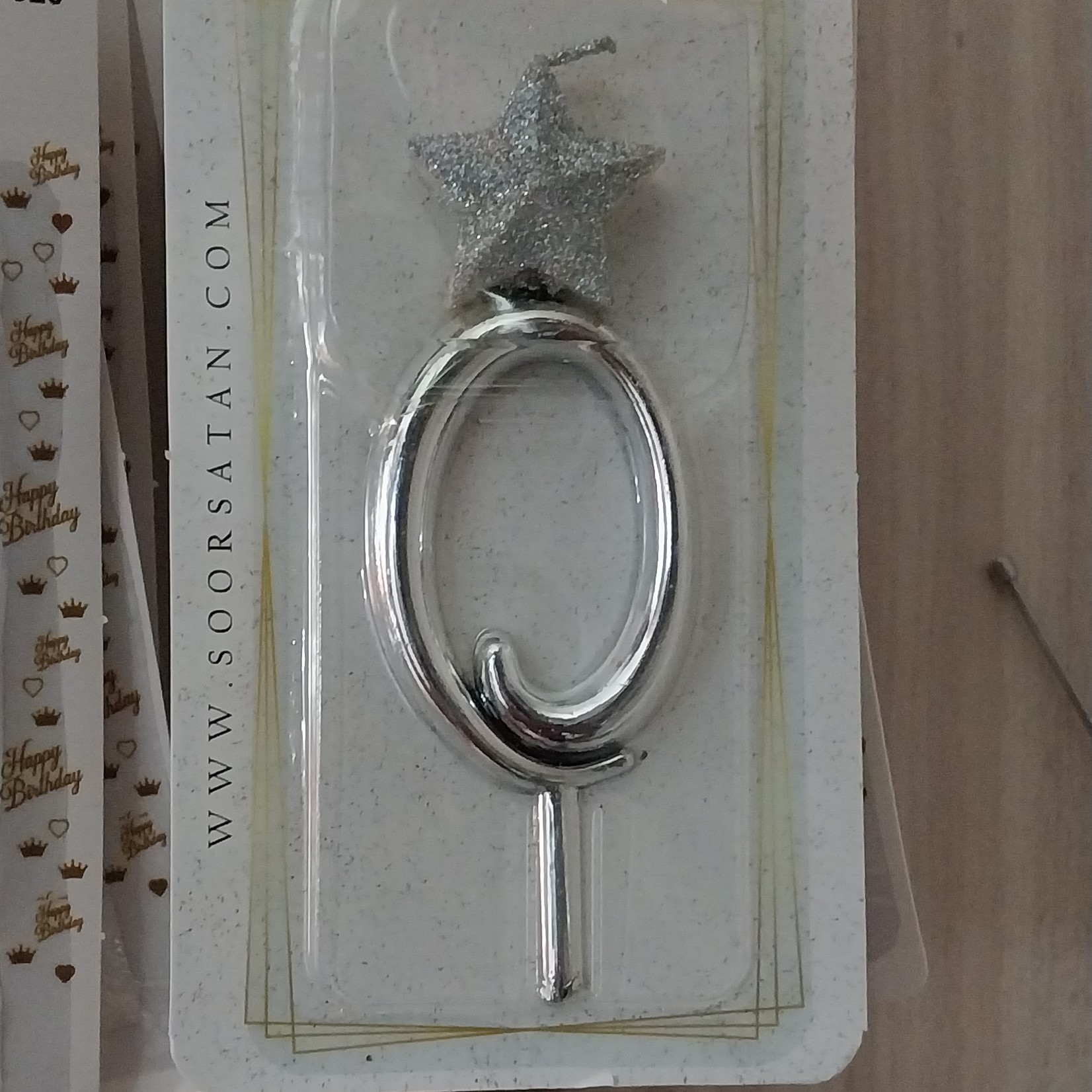 شمع تاج دار  و ستاره دارنقره ای عدد 0