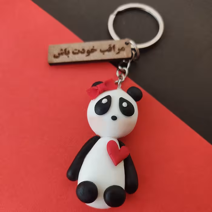 جاکلیدی دستساز شکل پاندا ساخته شده از خمیر ایتالیایی همراه با تگ چوبی