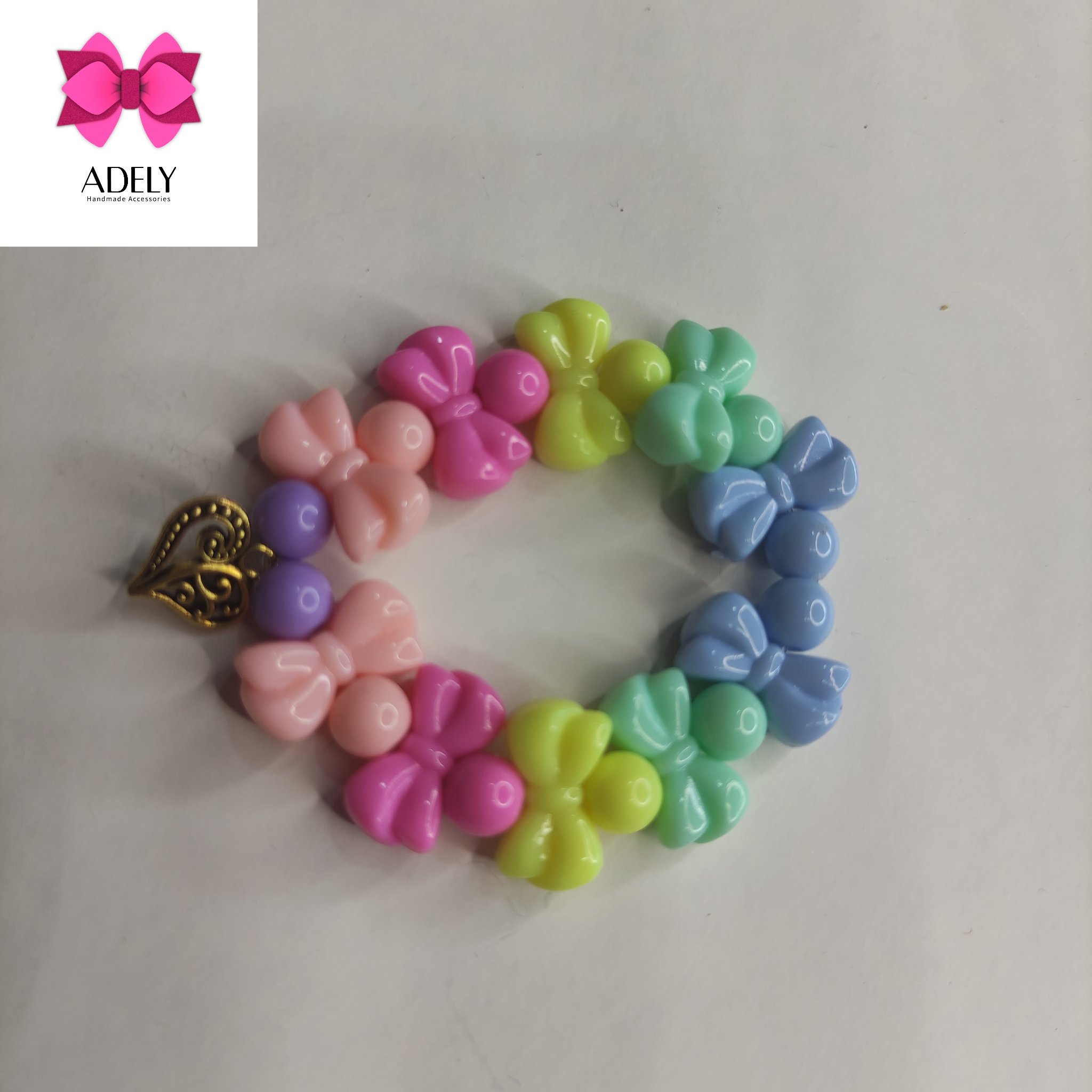 دستبند مهره ی پاپیونی و آویز قلب  کد 400