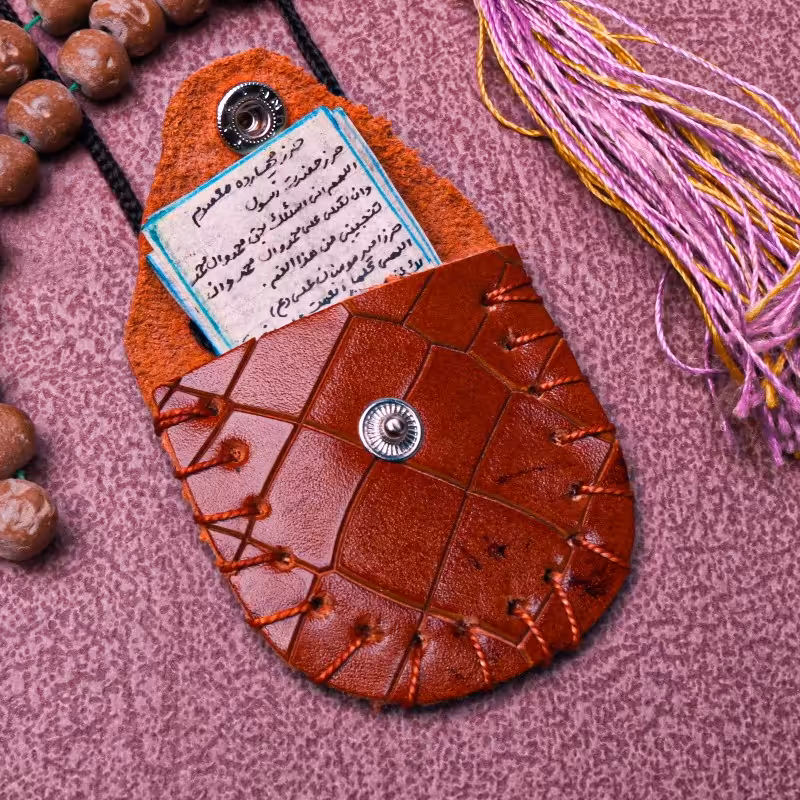 حرز چهارده معصوم سلام الله علیهم اجمعین بر روی پوست آهو نوشته شده در ساعت سعد برای حفاظت از شرور و برکت و آرامش