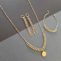 ست استیل گردنبند و دستبند و گوشواره کارتیر  تراش دار با آویز سکه ای ، رنگ ثابت ضدحساسیت ضد آب وآبکاری شده (طرح طلا) 