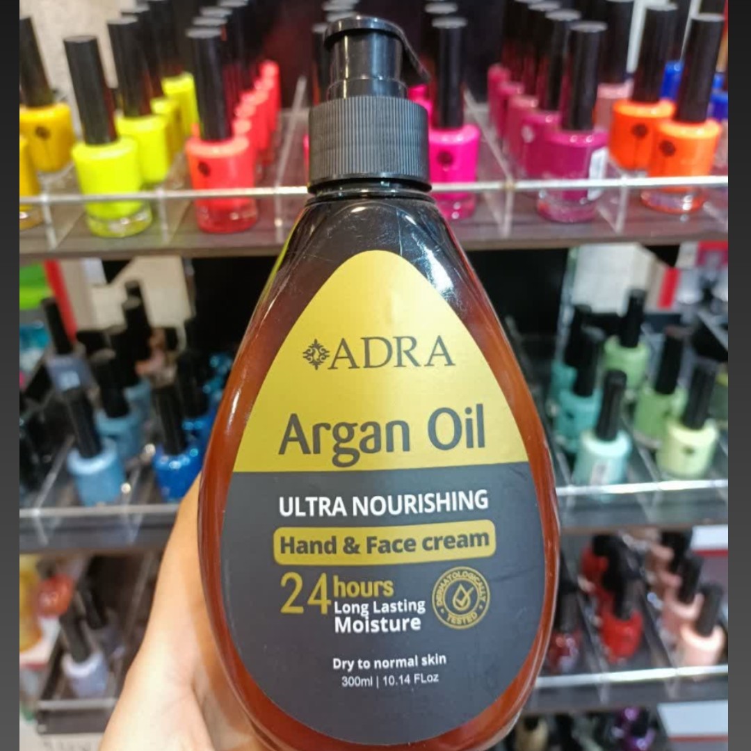 کرم پمپی مرطوب کننده دست و صورت آدرا حاوی روغن آرگان 300 میلی لیتر