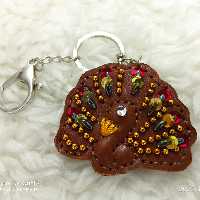 آویز کیف و جاسوییچی چرم طبیعی طاووس