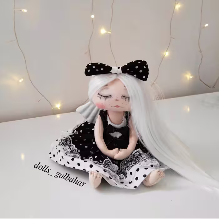 عروسک   خوابالو پارچه ای