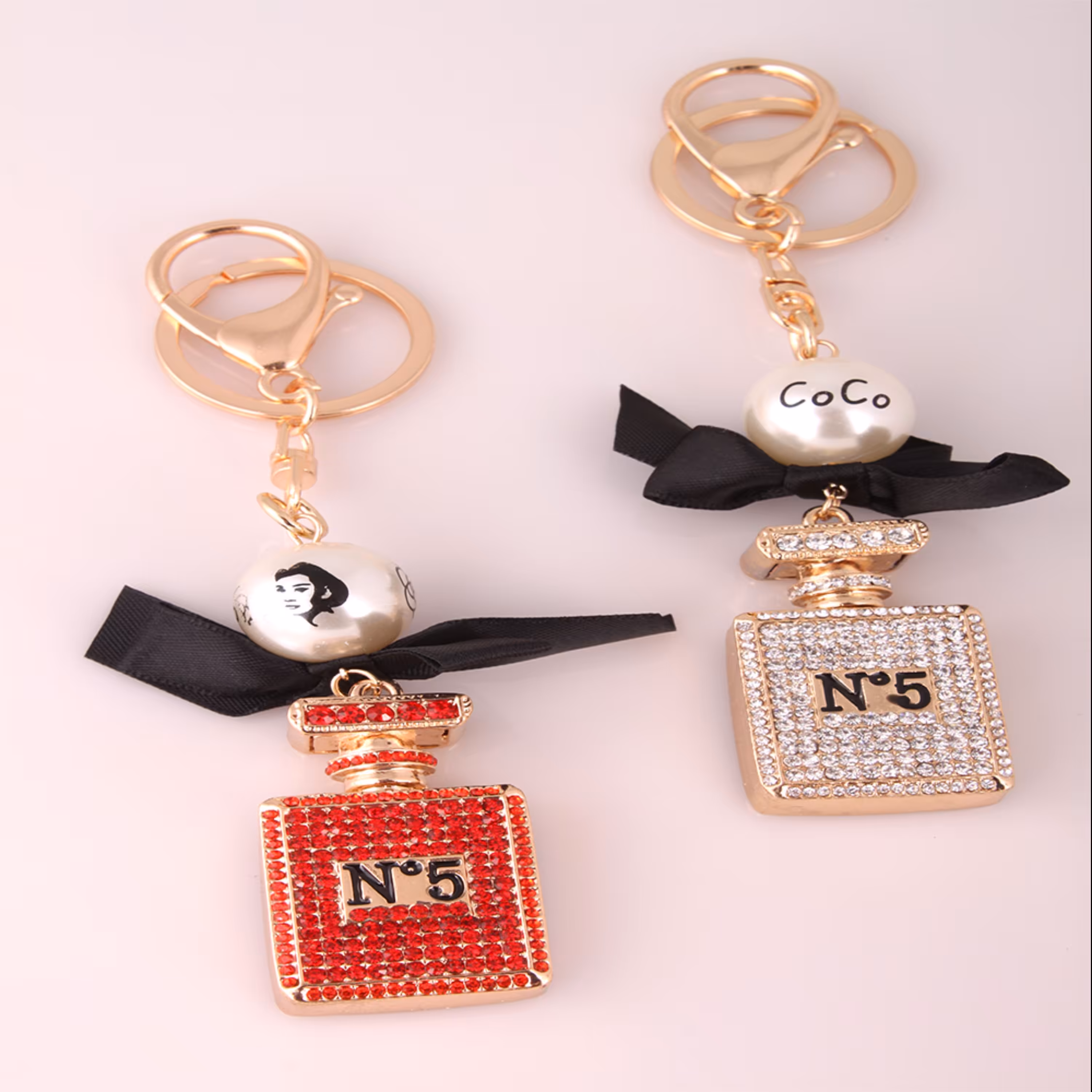 جاکلیدی طرح شیشه عطر با کریستال ریز