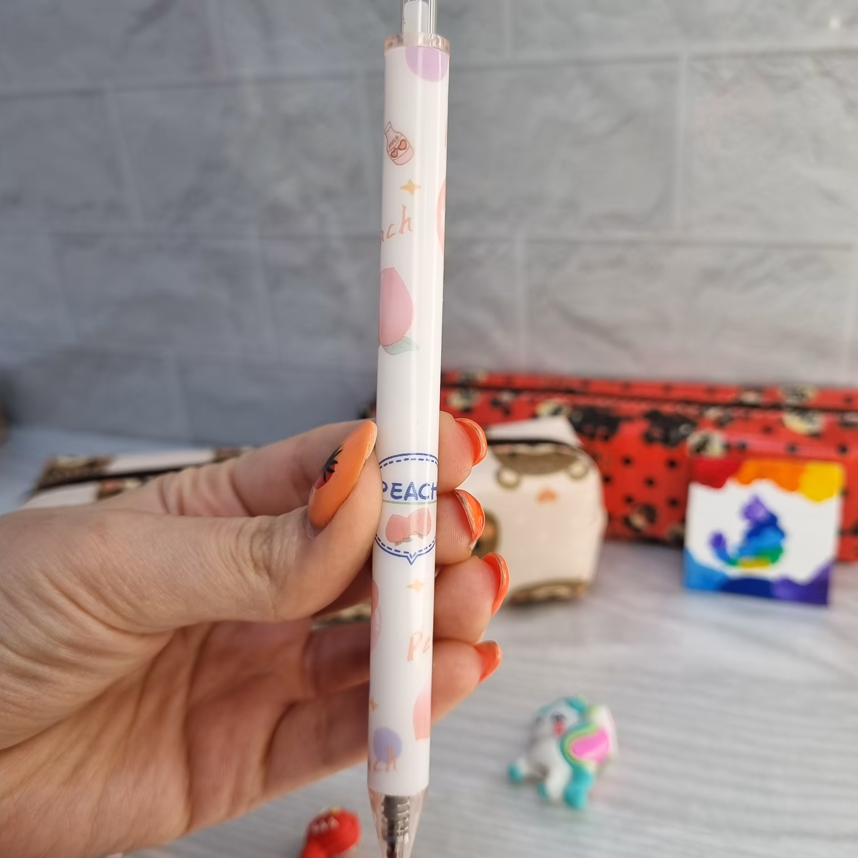 خودکار روان نویس فشاری طرح هلو 3 صورتی با جوهر مشکی 