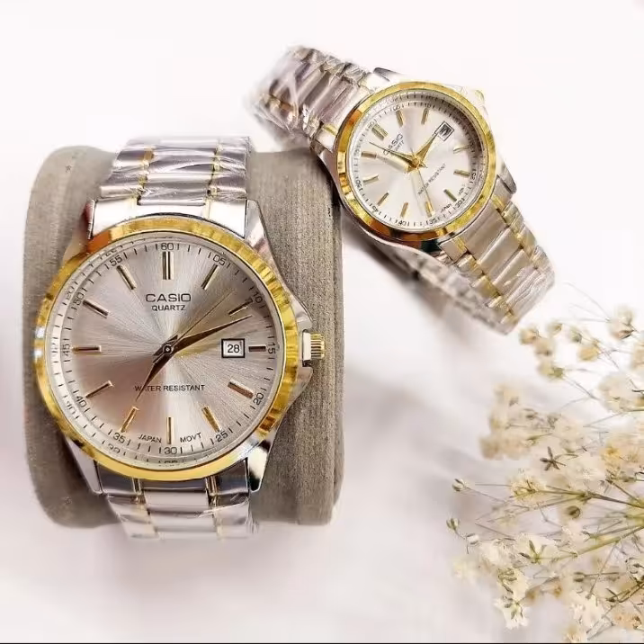 ساعت ست کاسیو  زنانه  و مردانه  CASIO تقویم دار بند استیل داخل صفحه و پشت ساعت هم حک شده ژاپن ارسال رایگان با جعبه