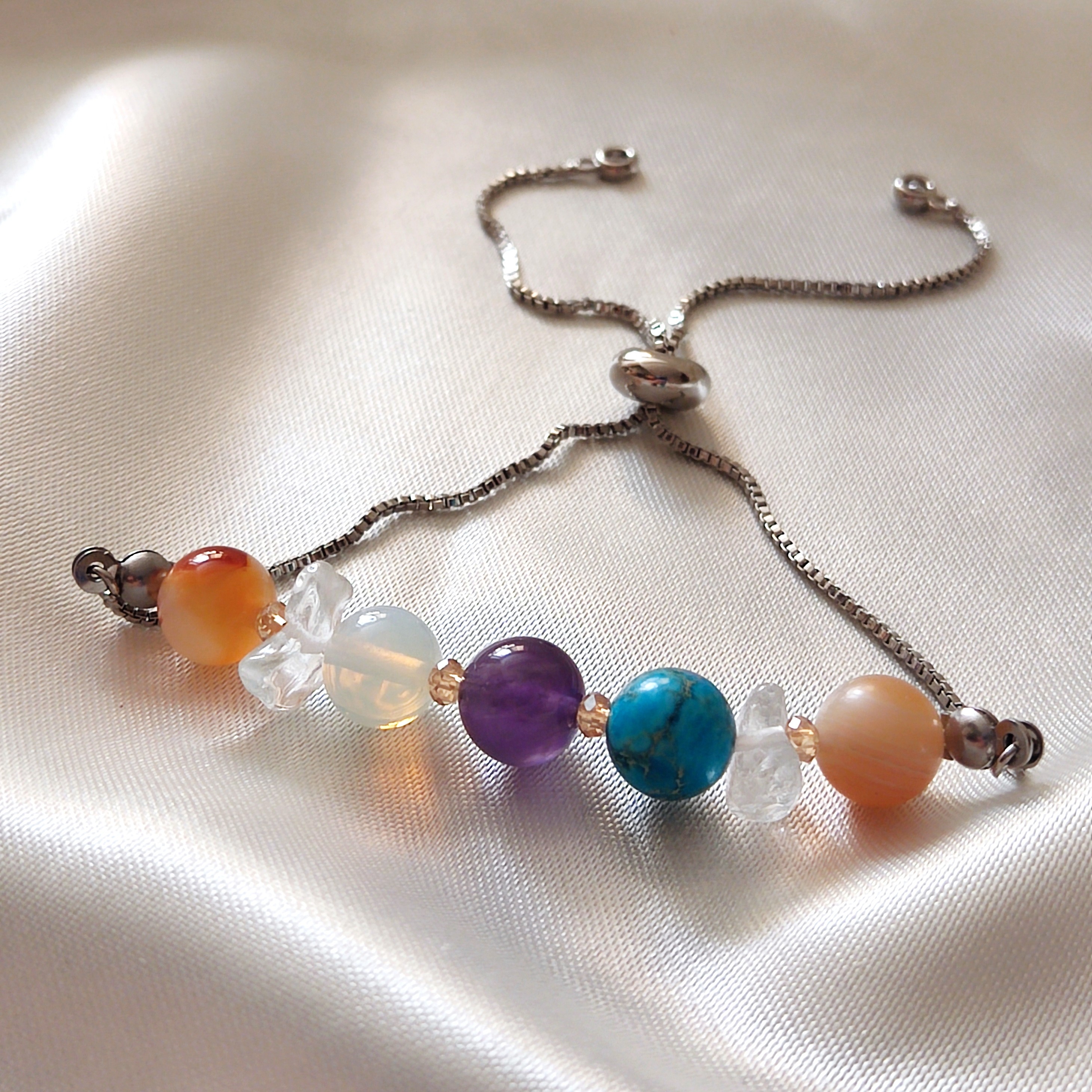 دستبند ماه تولد فروردین مدل آسانسوری با استیل رنگ ثابت 