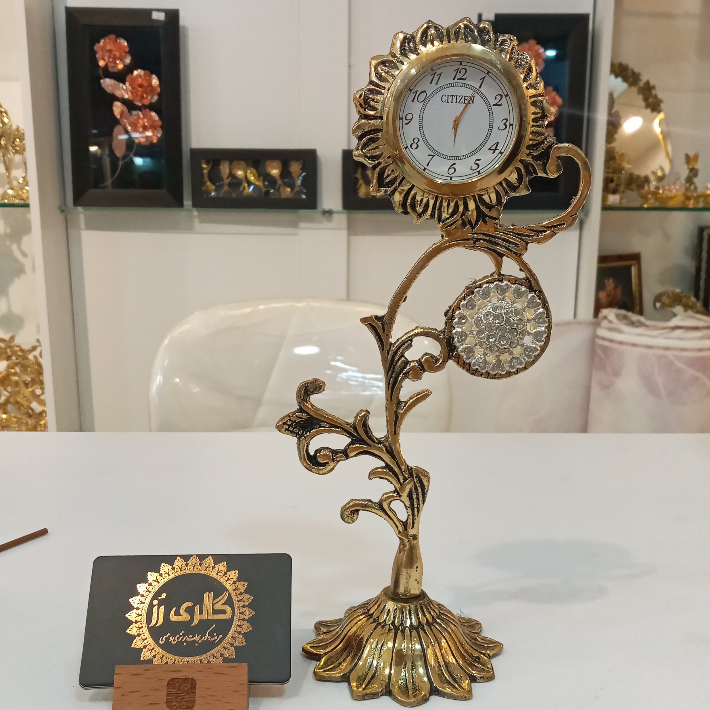 ساعت رو میزی برنجی (برنز ) طرح گل آفتابگردان سیاه قلم شده