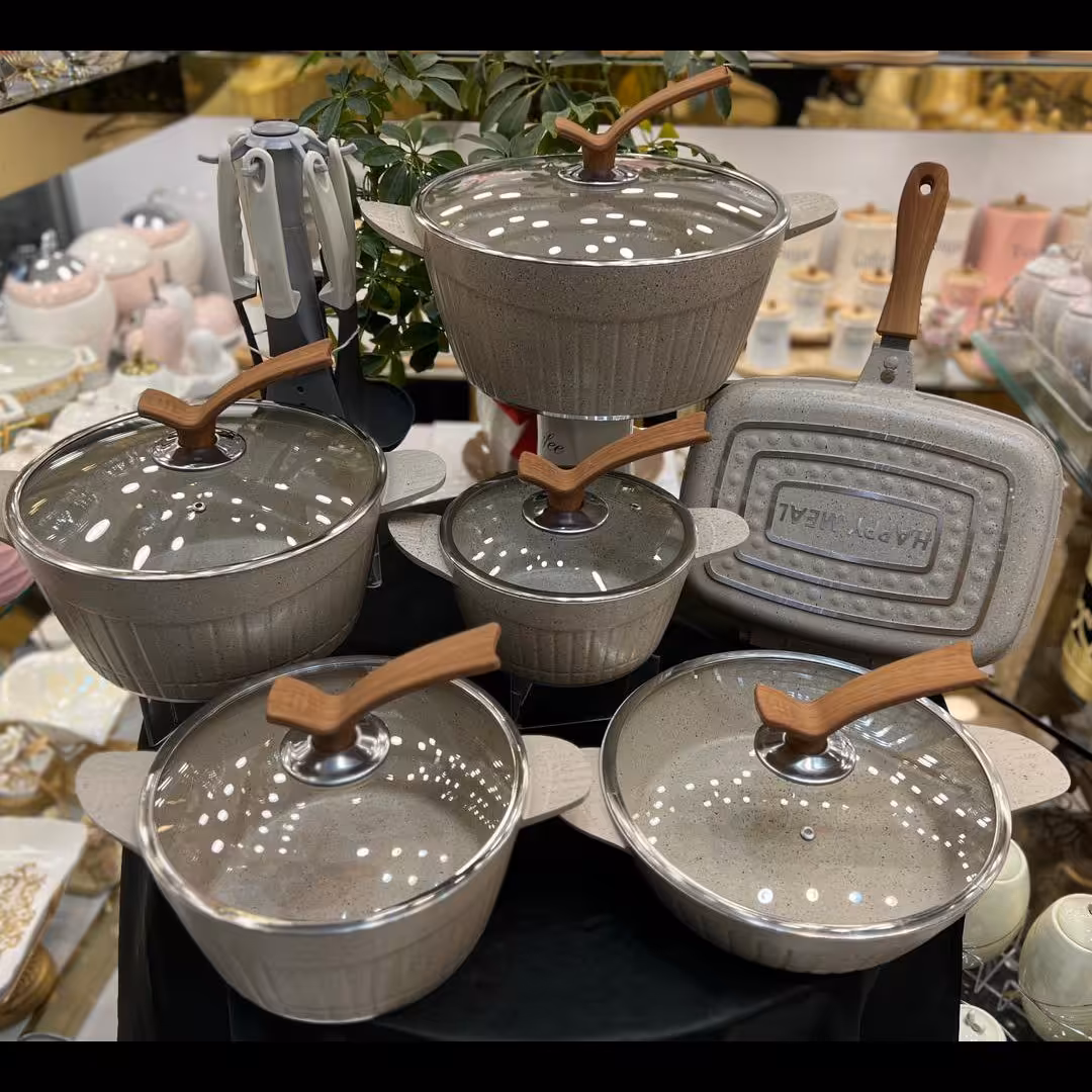 سرویس قابلمه 22 پارچه چدن گرانیت برند هافنر مدل دسته تیک رنگ نسکافه ای 