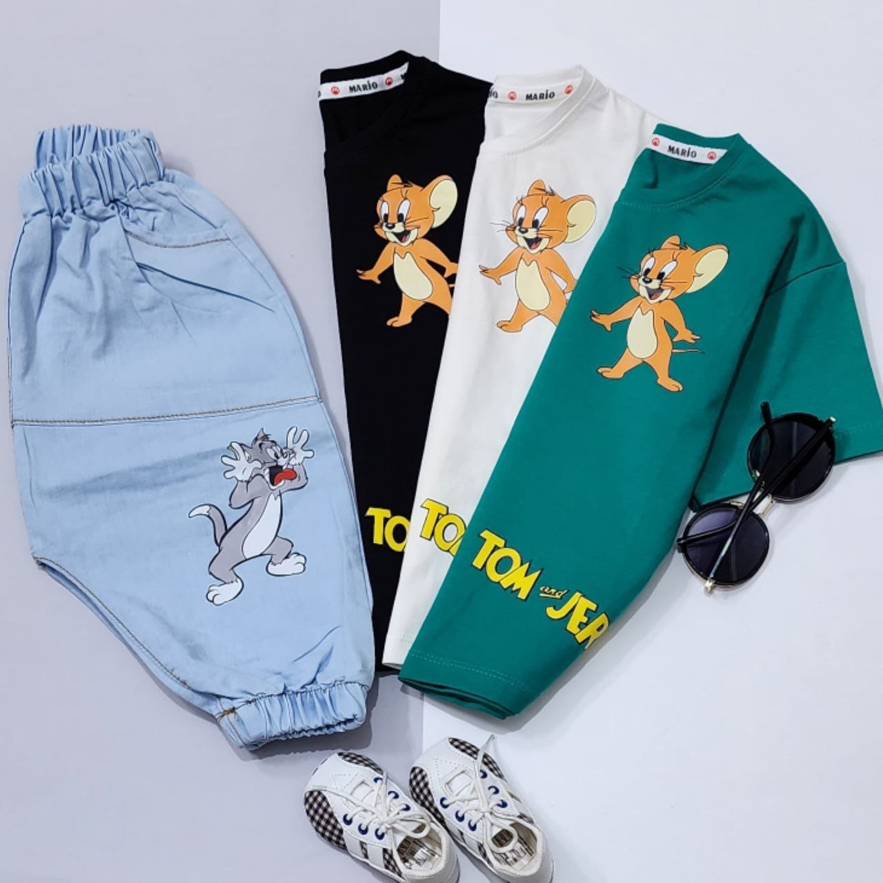 ست تیشرت و شلوارک اسپورت شیک و خوشگل مناسب حدود سنی 3 تا 10 سال قواره لانگ جنس تیشرت پنبه سوپر درجه یک تیپ لاکرا