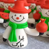 آدم برفی یلدایی ساخته شده با خمیر پلیمری نشکن