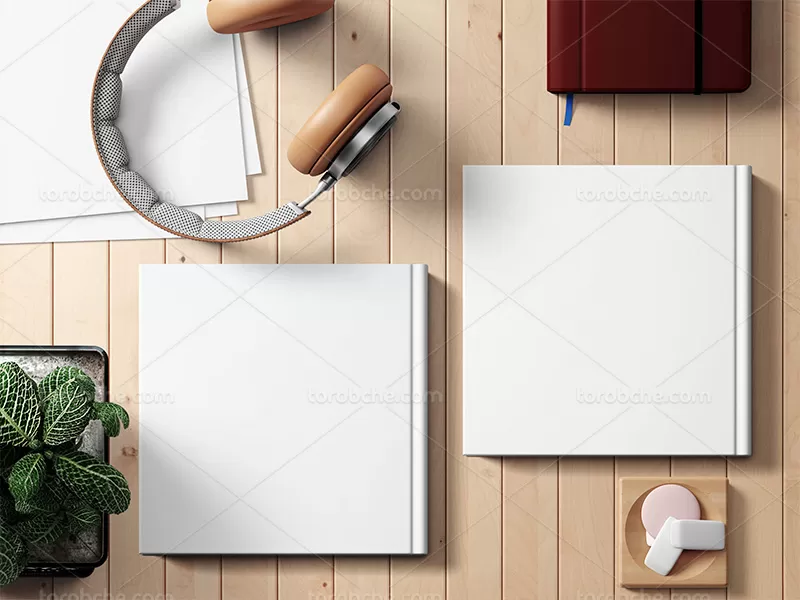 موکاپ لایه باز کتاب روی میز | گرافیک با طعم تربچه