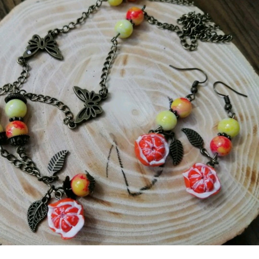 نیم ست نارنگی و پروانه