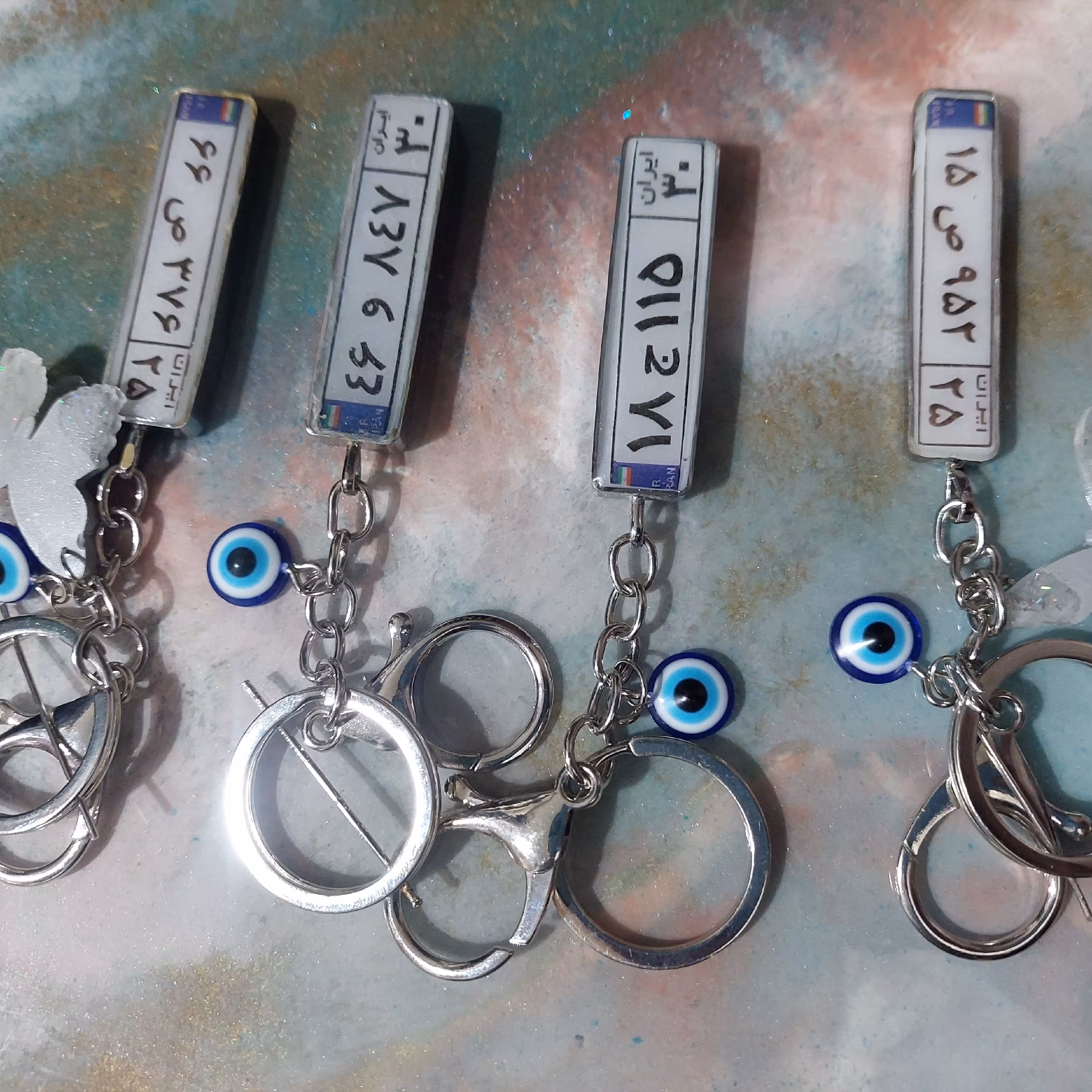 جا سوئیچی پلاک خودرو،فریم رنگ ثابت،رزین اپوکسی شفاف