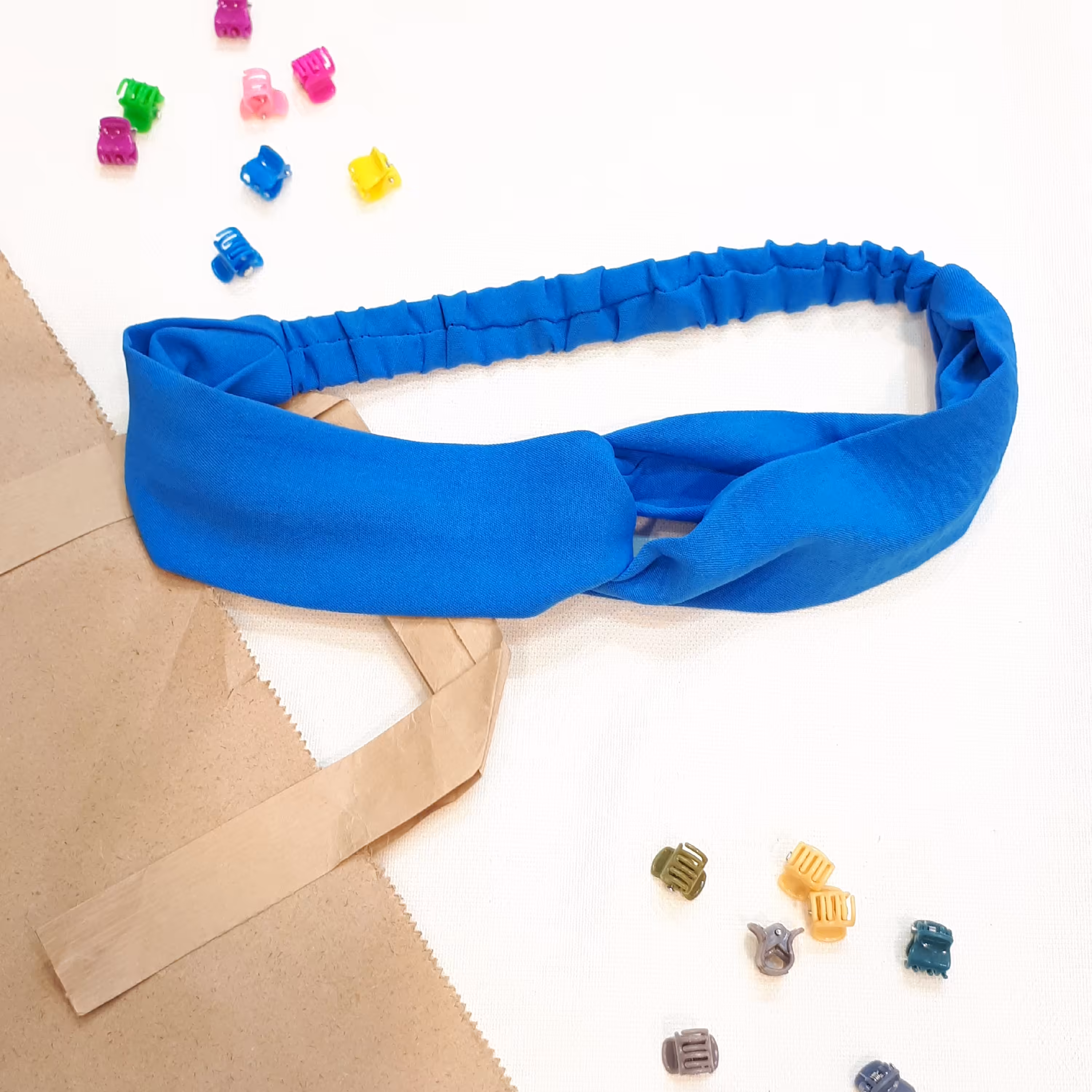 هدبند پارچه ای ( تل کشی ) رنگ آبی روشن