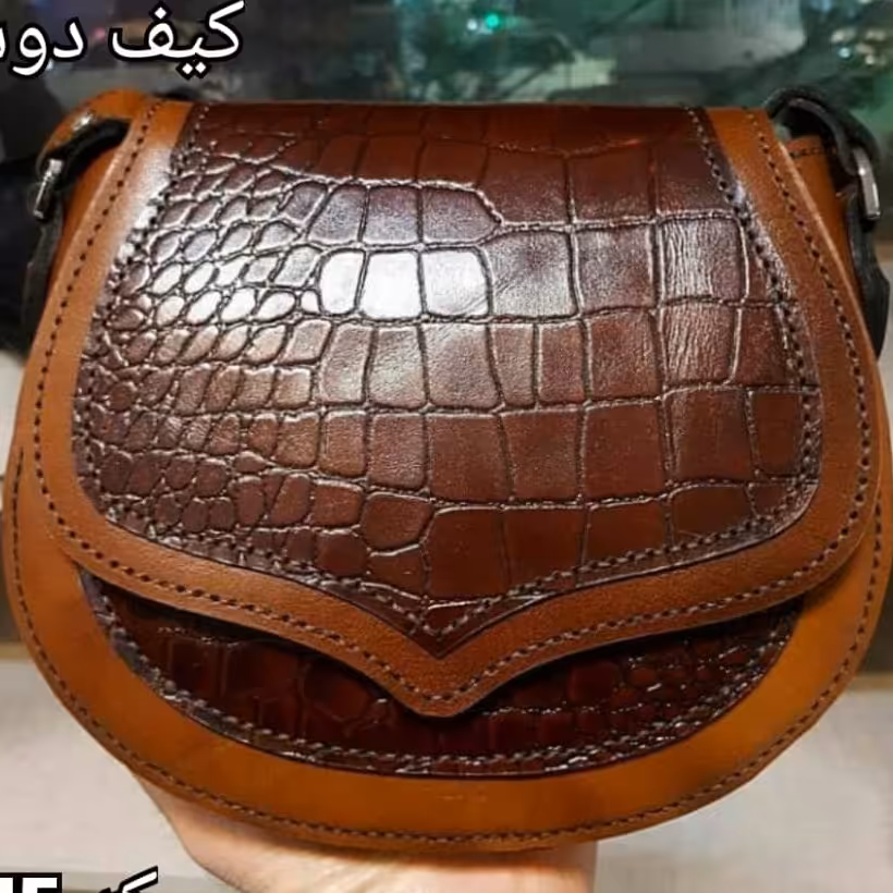 کیف زنانه دوشی مدل اشک بسیار زیبا    با چرم درجه 1 و نه درجه 1 دست ووز و با کیفیت 