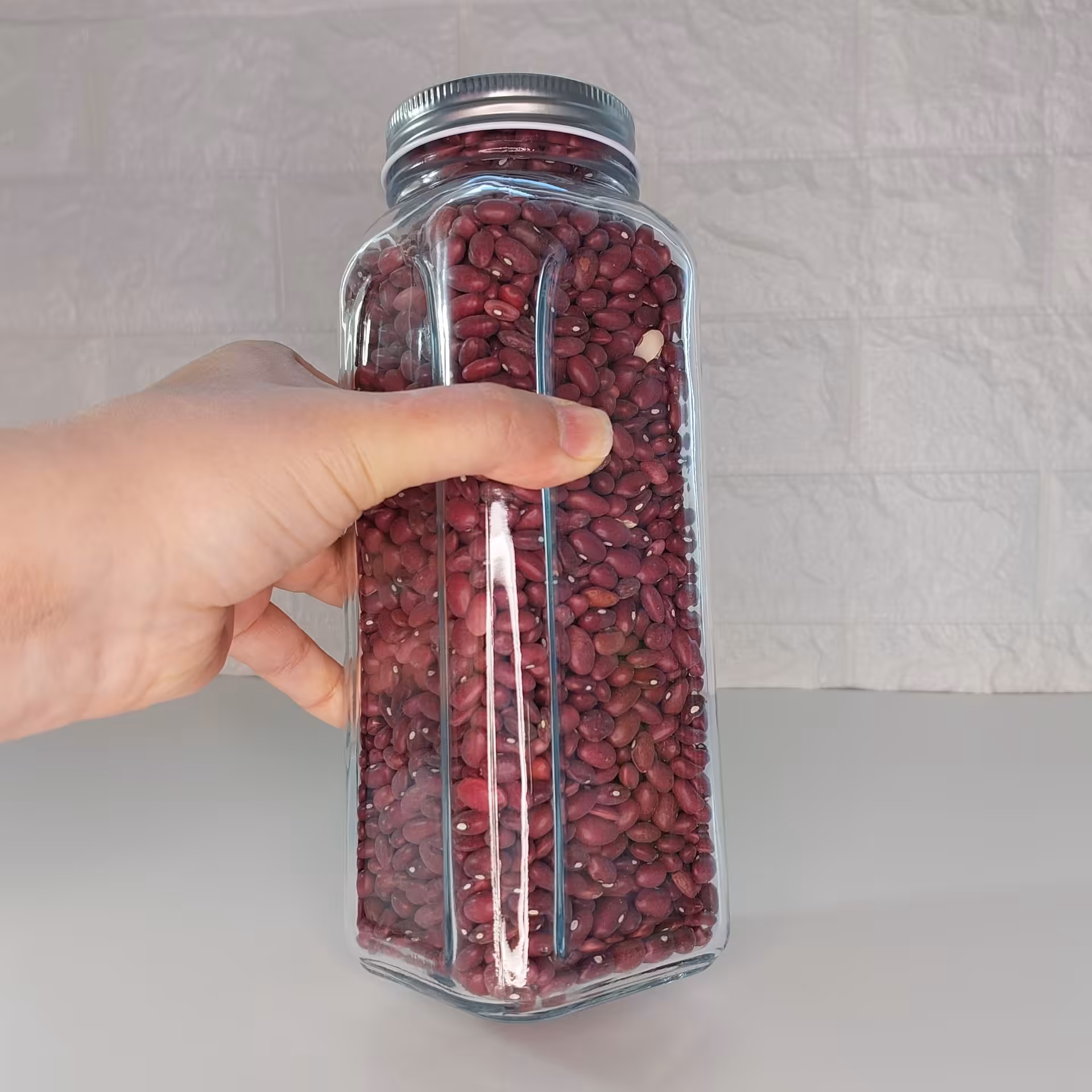 بانکه شیشه ای کندی 23سانتی(حبوباتی)درب کانتینری فلزی(سایز 1)