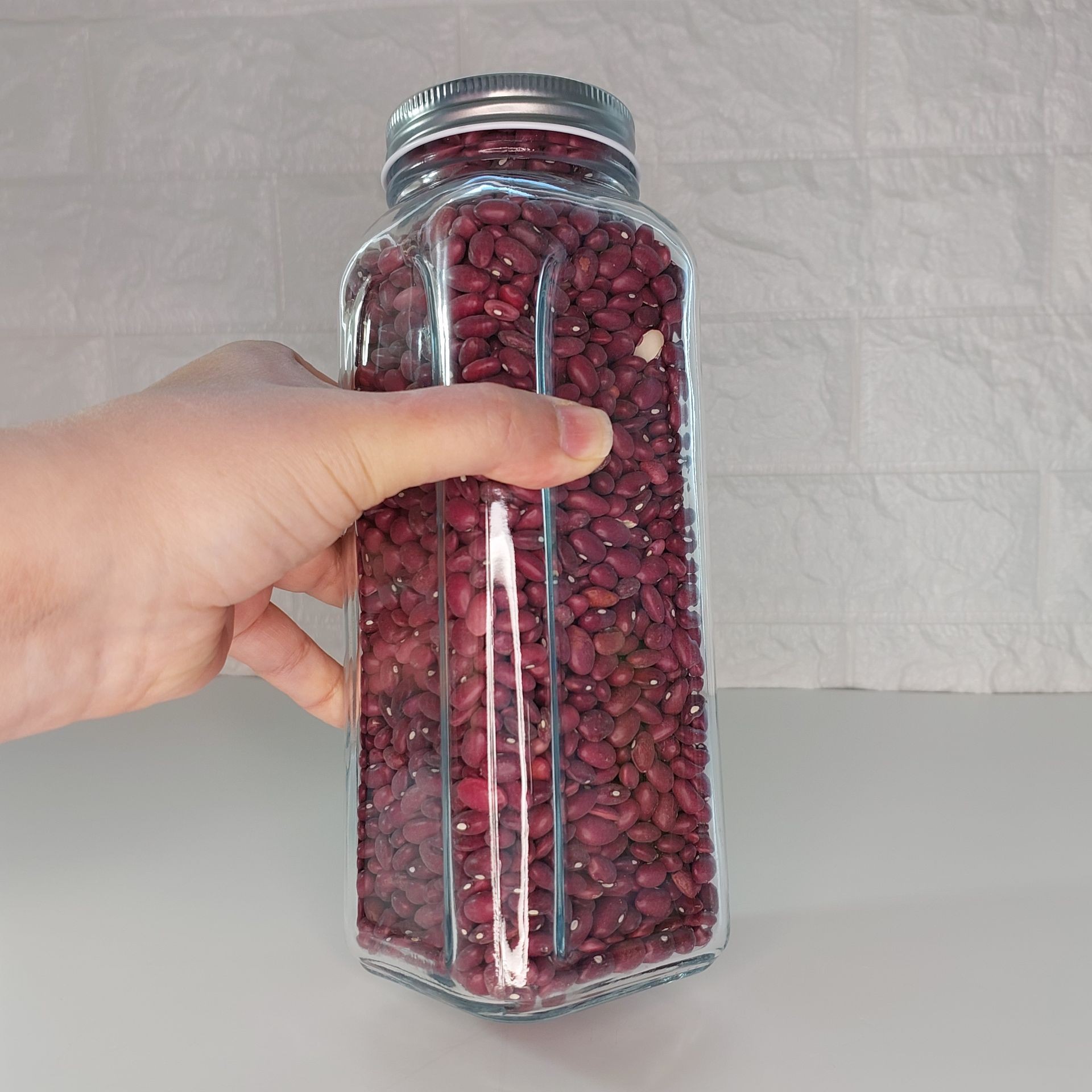 بانکه شیشه ای کندی 23سانتی(حبوباتی)درب کانتینری فلزی(سایز 1)